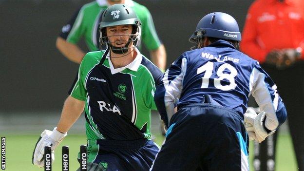 Ireland's Alex Cusack is stumped by Scotland's Craig Wallace