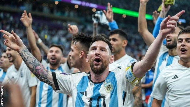 Lionel Messi and the Argentina squad celebrate after beating the Netherlands at the World Cup quarter-final in Qatar