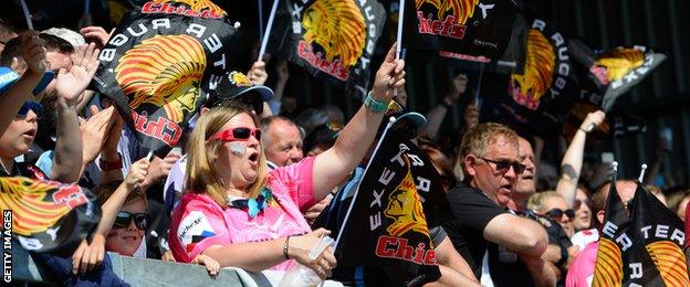 Exeter Chiefs fans wave flags during the 2018 Premiership semi-final against Newcastle