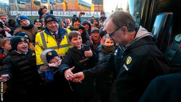 Marcelo Bielsa greeted by fans