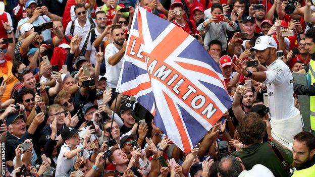 Lewis Hamilton waves to the crowds at Monza