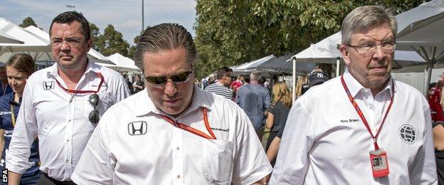 McLaren-Honda racing director Eric Boullier (left), McLaren CEO Zak Brown (centre), and Ross Brawn, Formula One Group"s Managing Director of Motorsports, in Australia