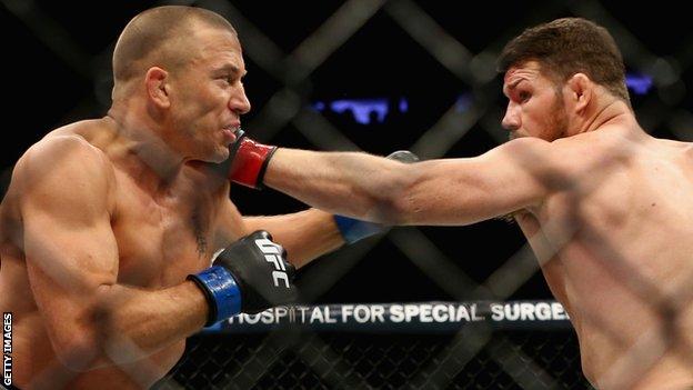 Georges St-Pierre beat Michael Bisping