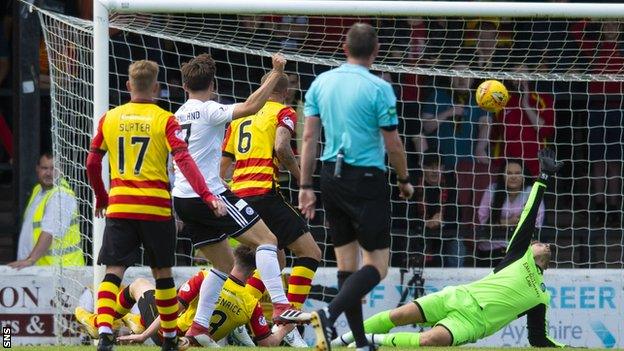 Ayr United's Lawrence Shakland scores against Partick Thistle