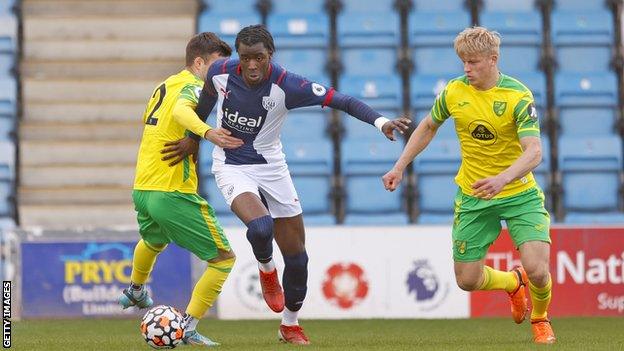 Saxon Earley (right) in action for Norwich