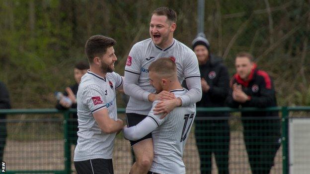 Pontypridd Town players celebrate during their 4-1 win over Llanelli Town earlier this month