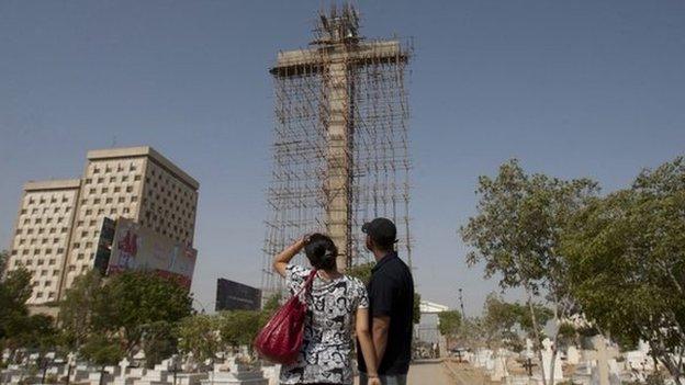 Cross under construction in Karachi Christian cemetery