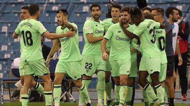 Athletic Bilbao celebrate beating Atletico Madrid