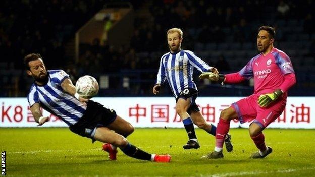 Steven Fletcher (left) in action for Sheffield Wednesday