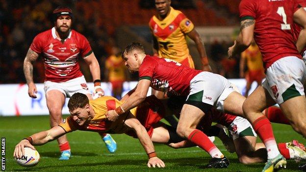 Dan Russell stretches to score Papua New Guinea's fourth try against Wales