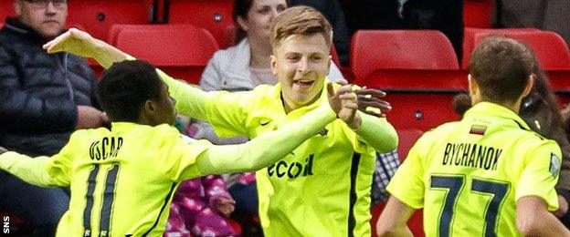 Trakai's Maksim Maksimov celebrates scoring the opening goal