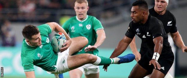 Ireland's Jacob Stockdale with Sevu Reece of New Zealand