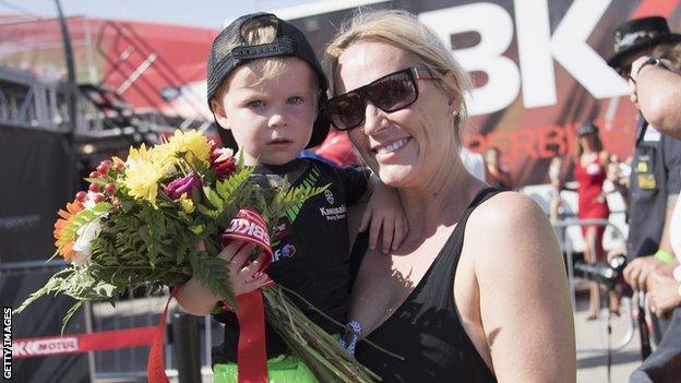 Wife Tatia and eldest son celebrate their husband and dad's second race win at Portimao on 16 September