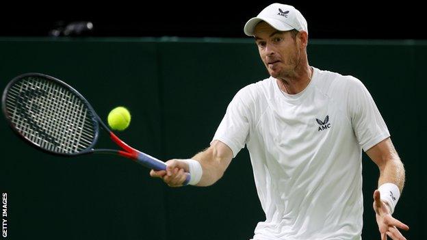 Andy Murray hits a forehand