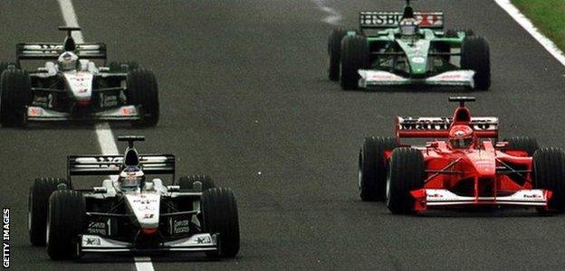 Mika Hakkinen of McLaren gets ahead of Michael Schumacher of Ferrari before the first corner during the Japanese Grand Prix at Suzuka, Japan, 2000