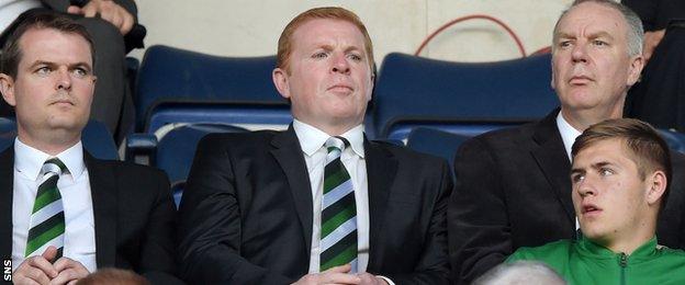 Neil Lennon watches from the stands