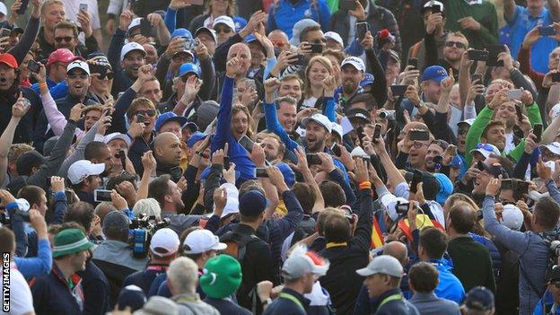 Tommy Fleetwood is hoisted aloft by European fans at the 2018 Ryder Cup in France