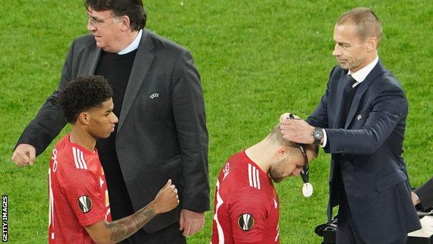 Manchester United players receive their runners up medals