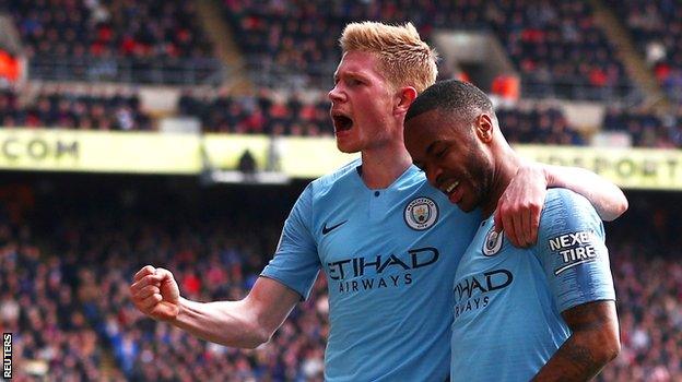 Kevin de Bruyne celebrates City's second goal with goalscorer Raheem Sterling