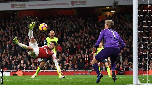 Arsenal midfielder Lucas Torreira scores a fine overhead kick to secure victory over Huddersfield