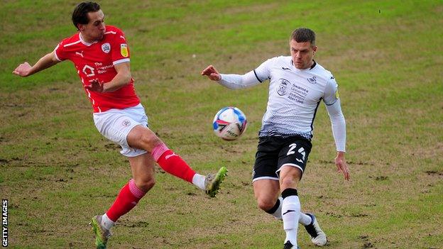 Swansea's old pitch appeared to be cutting up badly during the game against Barnsley on 19 December