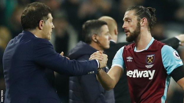 Andy Carroll (right)