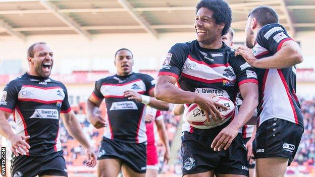 Oscar Thomas (second right) celebrates a try for London Broncos