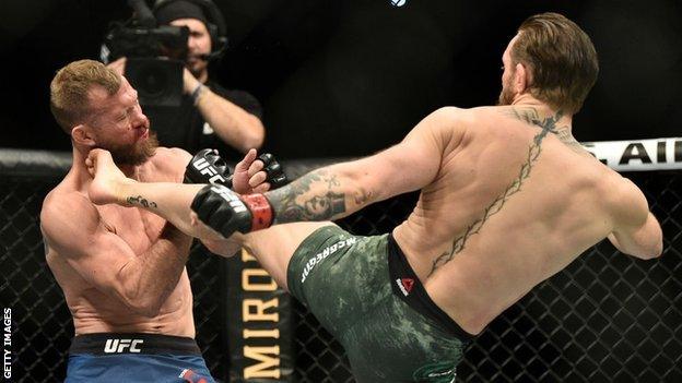 Conor McGregor kicks Donald Cerrone