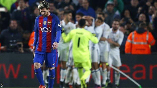 Barcelona's Lionel Messi reacts at the final whistle after Real Madrid win El Clasico