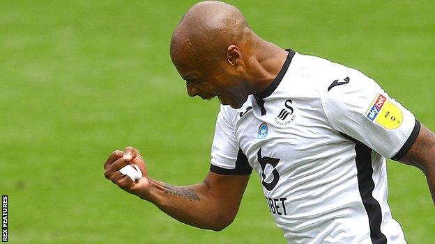 Andre Ayew celebrates scoring Swansea's second goal