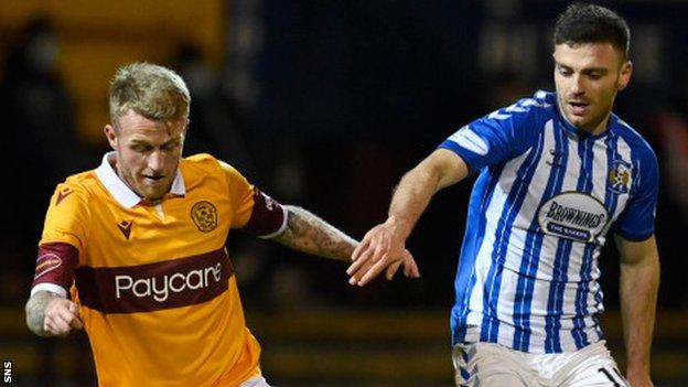 Motherwell's Robbie Crawford (left) in action against Kilmarnock