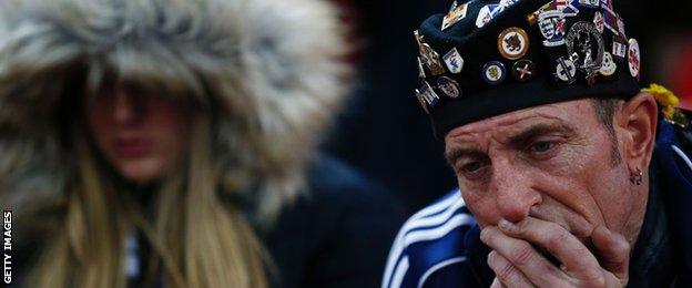 A Scotland fan looks depressed at Wembley