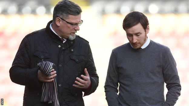 Craig Levein talks to Ian Cathro, the club's former head coach