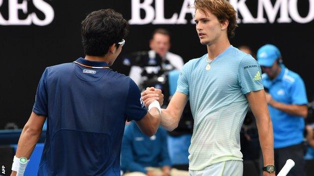 Zverev and Hyeon shake hands at the end of the match