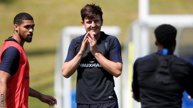 England defender Harry Maguire (centre)