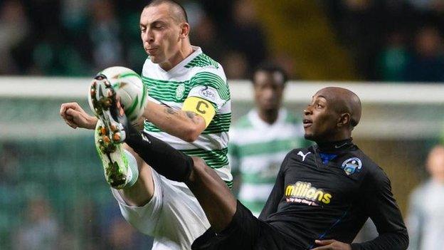 Fouad Bachirou (right) battles with Celtic captain Scott Brown