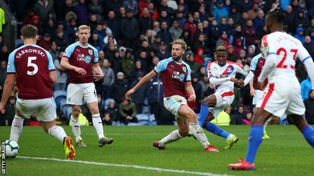Wilfried Zaha scores against Burnley
