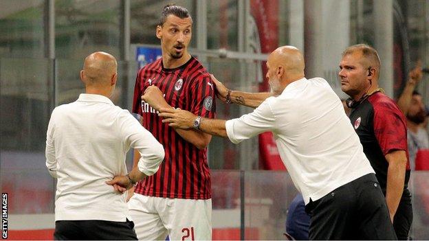 Stefano Pioli (second right, pictured with AC Milan striker Zlatan Ibrahimovic) has also managed Lazio, Inter Milan and Fiorenina among others