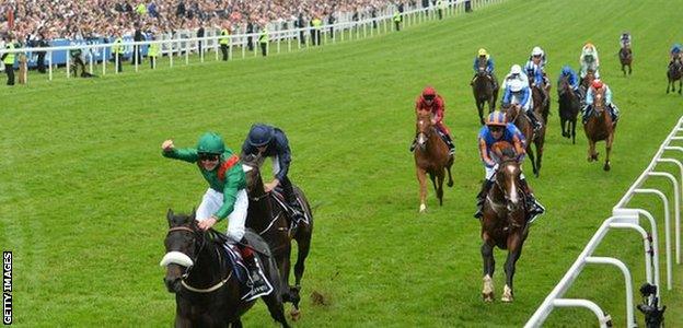 Pat Smullen riding Harzand win The Investec Derby at Epsom Racecourse in June 2016