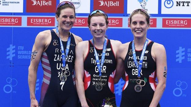 Britons Georgia Taylor-Brown (c) and Jess Learmonth (r) celebrate top three finishes at WTS Leeds in June, alongside American Katie Zaferes.