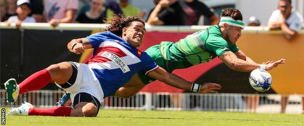 Greg O'Shea scores a try against France