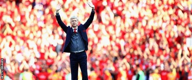 Arsene Wenger waves goodbye to the Emirates faithful