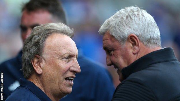 Rival managers Neil Warnock and Steve Bruce talk before kick-off in Cardiff