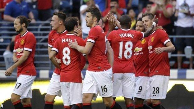 Manchester United players celebrate