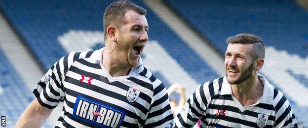 One-club man Tony Quinn heads off to celebrate a goal for Queen's Park