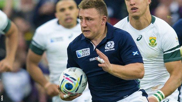 Duncan Weir runs with the ball for Scotland against South Africa at the World Cup