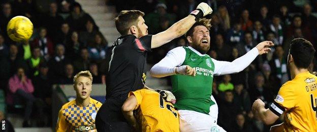 Grant Holt heads wide