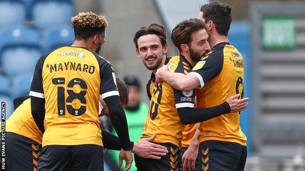 Newport players congratulate Joss Labadie