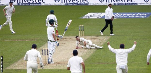 James Anderson takes a caught and bowled dismissal