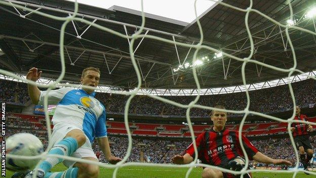 Rickie Lambert follows up to make sure as the second of Richard Walker's two goals goes in to beat Shrewsbury in the 2007 League Two play-off final